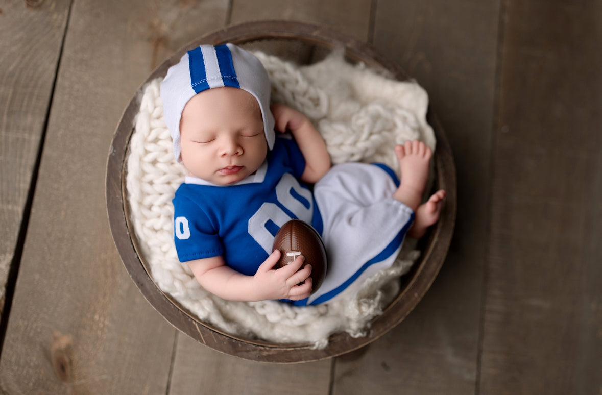 baby wearing football helmet Newborn Football Uniform – No. 2 Willow Lane
